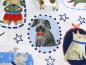 Preview: Patchworkstoff mit Hunden und Zicklein von Timeless Treasures grauer Hund mit roter Schleife